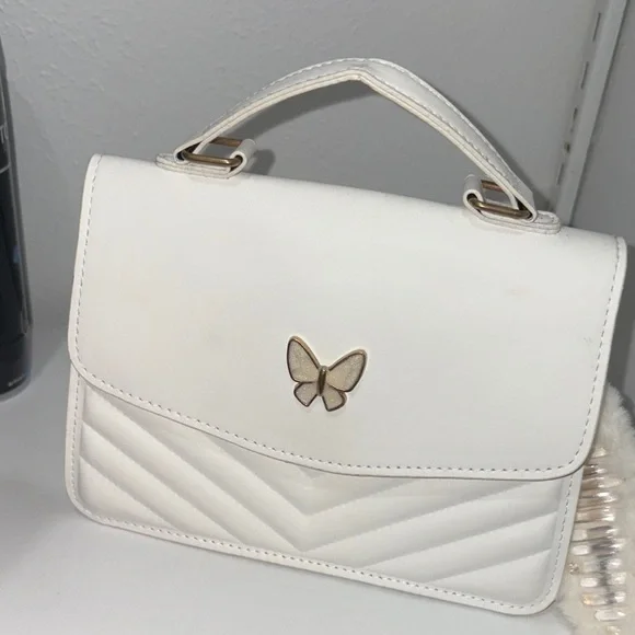 Elegant White Handbag with Butterfly Accent - Picture 1 of 1